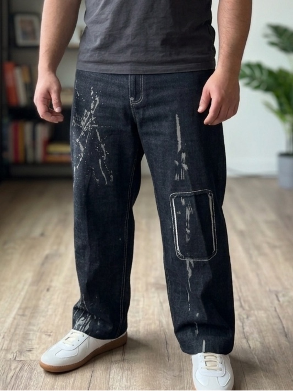 These wide-leg black jeans with white paint splatters Size 36x28